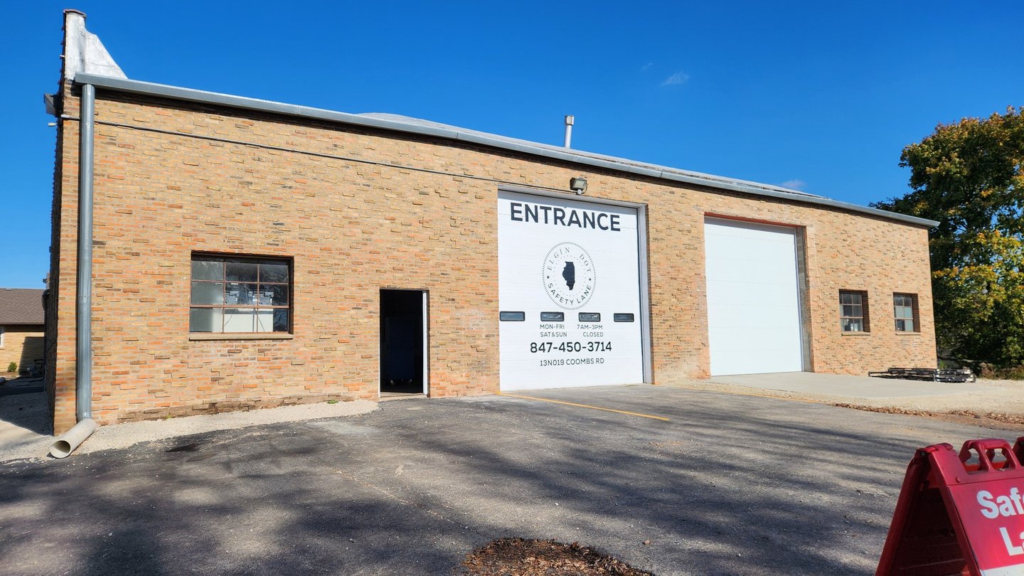 Elgin DOT Safety Lane facility entrance at 13N019 Coombs Rd, Elgin, IL — drive-thru safety inspection lane